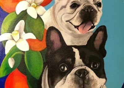 colorful memorial pet portrait of two French bulldogs, one black and white and one tan-colored, set against a blue background with an orange and blossoms motif